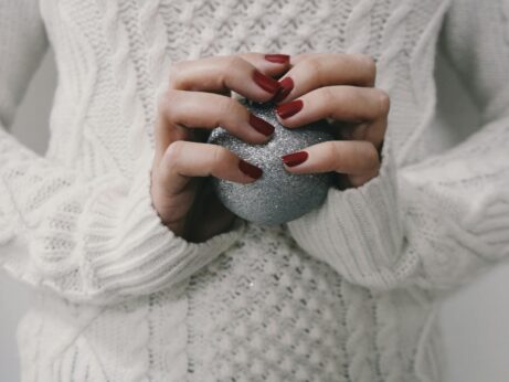 https://www.pexels.com/photo/person-holding-gray-ball-239576/