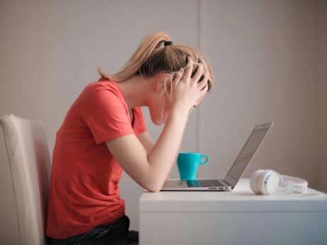 https://www.pexels.com/photo/woman-in-red-t-shirt-looking-at-her-laptop-3755761/