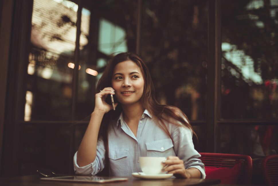 https://www.pexels.com/photo/portrait-of-young-woman-using-mobile-phone-in-cafe-323503/