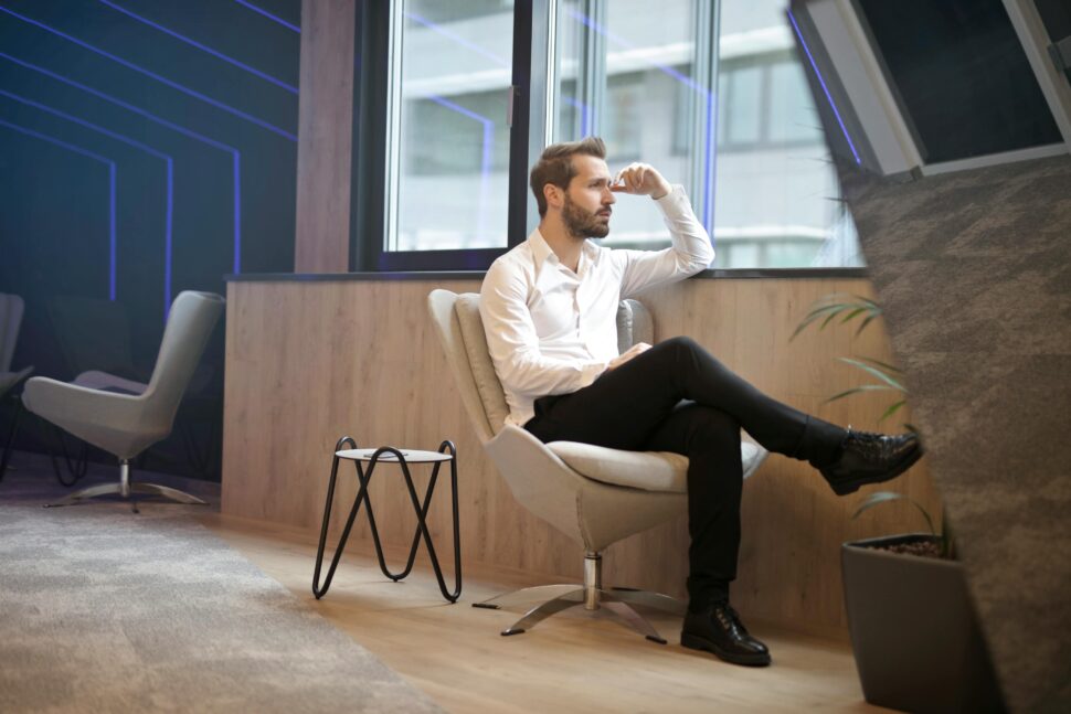 https://www.pexels.com/photo/photo-of-a-man-sitting-near-the-windoww-846747/