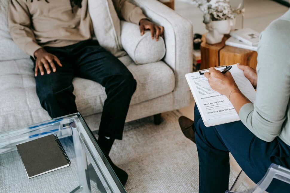https://www.pexels.com/photo/crop-unrecognizable-black-man-sharing-complains-with-female-psychologist-5699466/