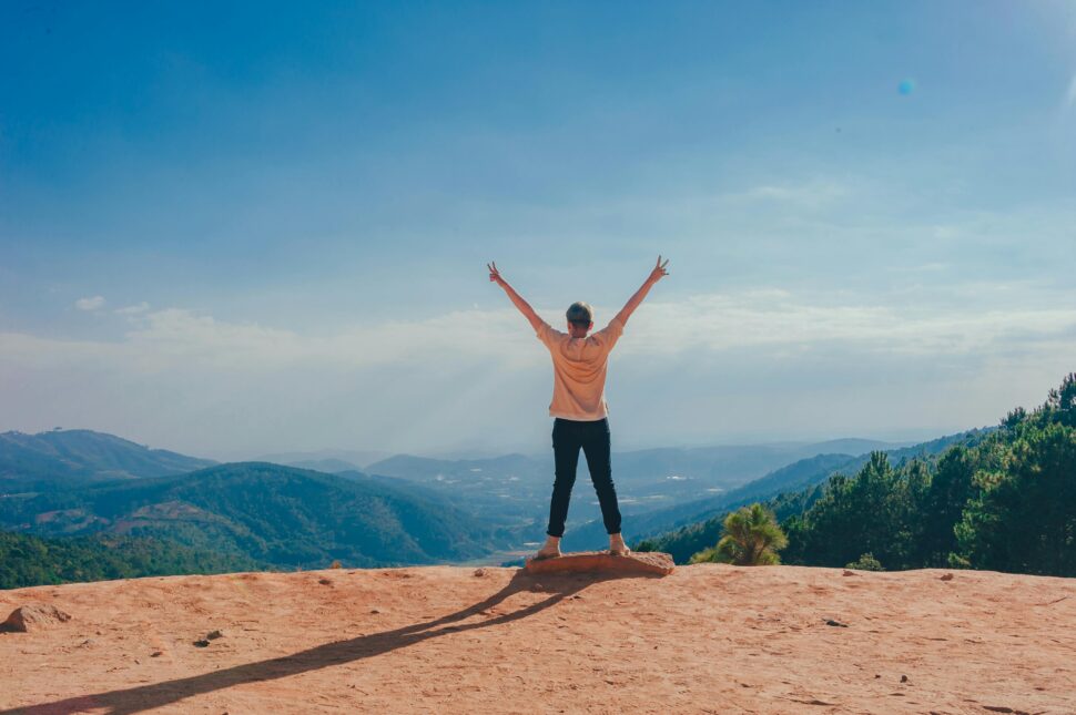 https://www.pexels.com/photo/woman-standing-on-cliff-1134190/