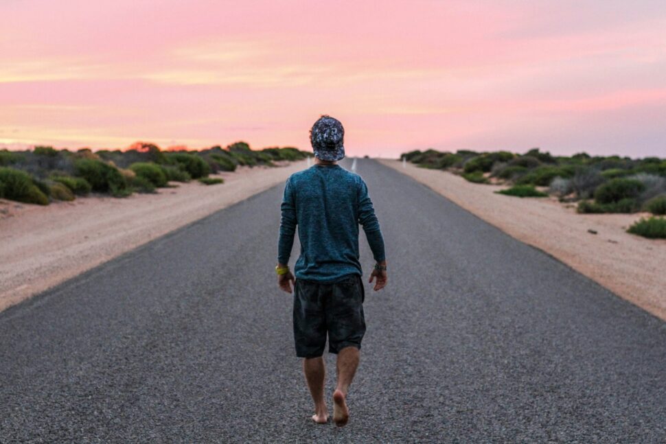 https://unsplash.com/photos/man-walking-on-gray-concrete-road-rBx6r5OUt7s