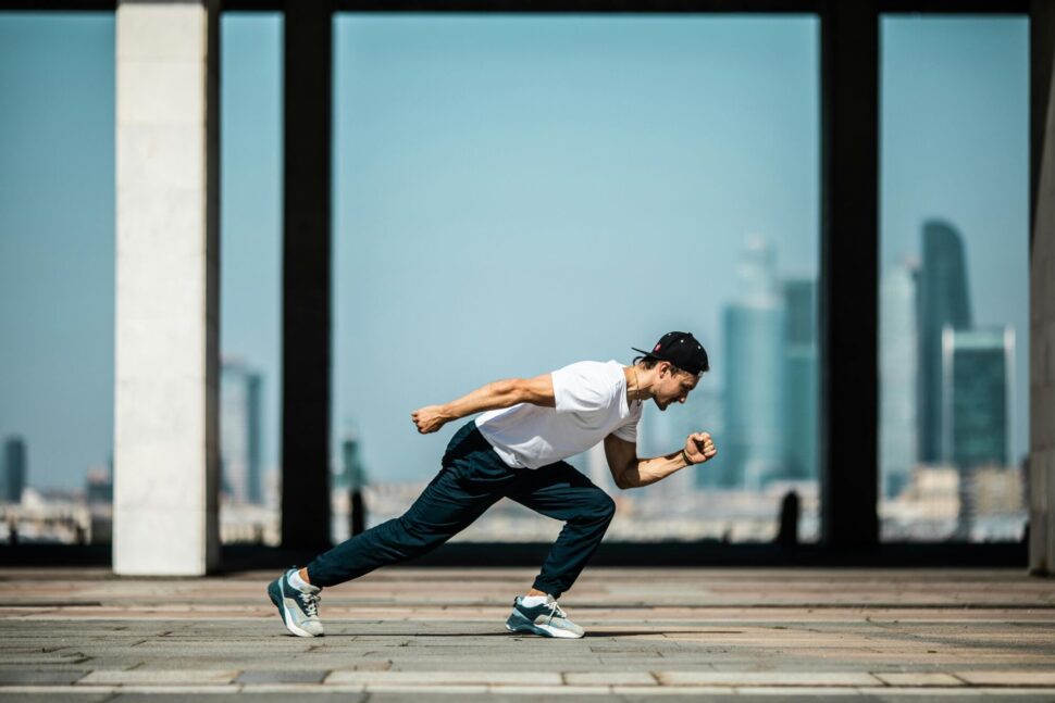 https://www.pexels.com/photo/man-in-white-t-shirt-and-black-pants-in-a-running-position-4048182/