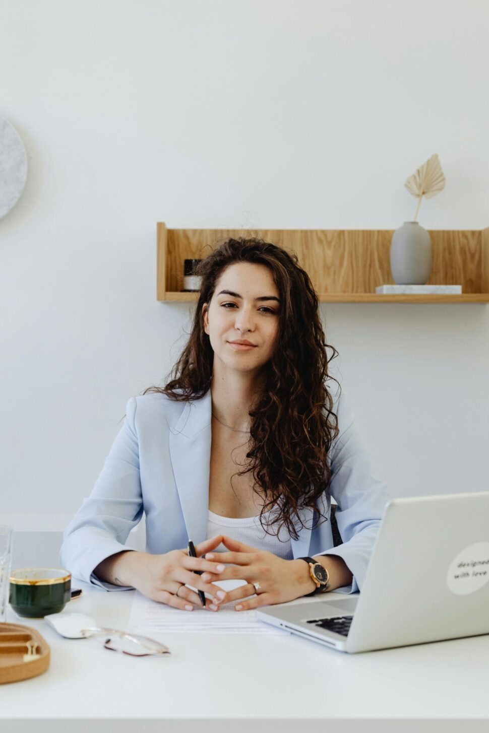 https://www.pexels.com/photo/a-businesswoman-working-inside-an-office-8528744/
