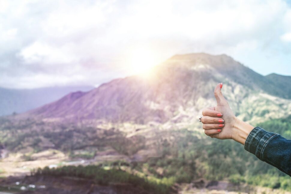 https://unsplash.com/photos/human-showing-hand-on-top-of-mountain-gx3iBnRUekI