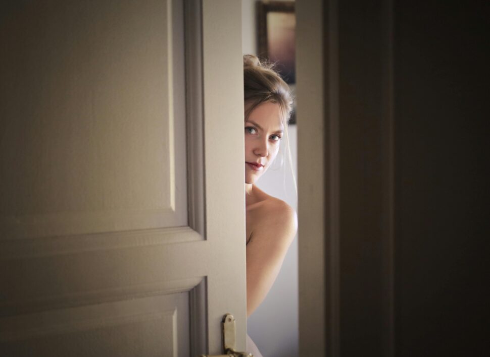 https://www.pexels.com/photo/photo-of-woman-behind-door-1459558/