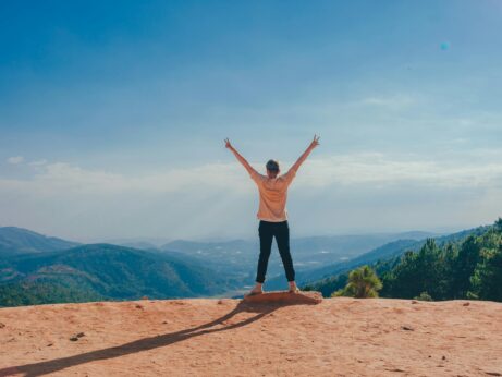 https://www.pexels.com/photo/woman-standing-on-cliff-1134190/